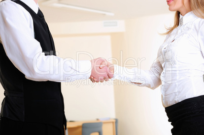 young girl shakes hands