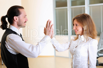 young girl claps her hands