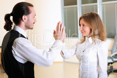 young girl claps her hands