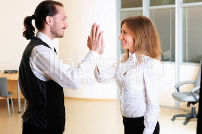 young girl claps her hands