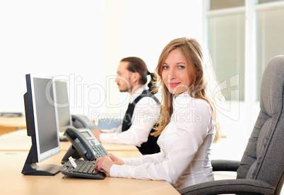 young girl in his office