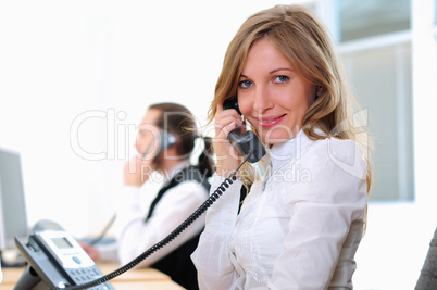 young girl in his office