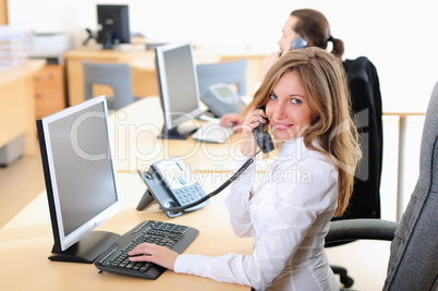 young girl in his office