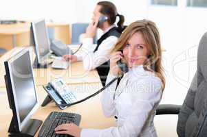 young girl in his office