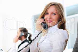 young girl in his office