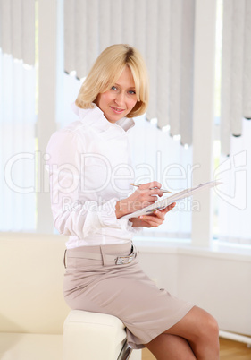 young business woman with papers