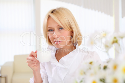 portrait of young lady with a cup