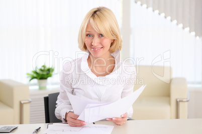 young business woman with papers