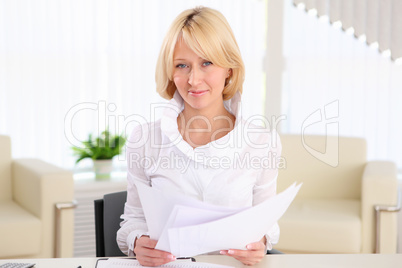 young business woman with papers