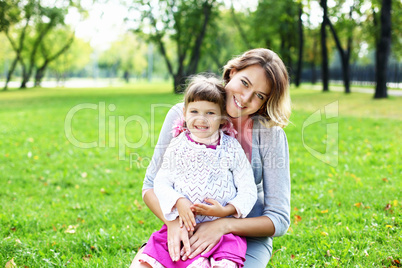 Mother and daughter in park
