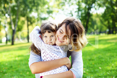 Mother and daughter in park