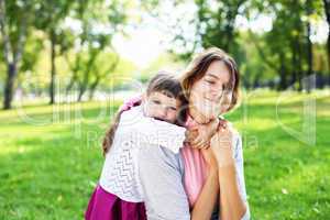 Mother and daughter in park