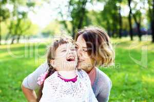 Mother and daughter in park