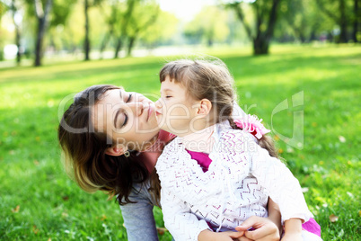 Mother and daughter in park