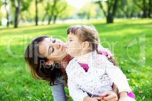 Mother and daughter in park