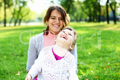 Mother and daughter in park