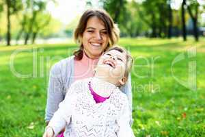 Mother and daughter in park