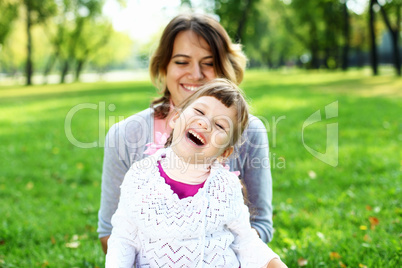 Mother and daughter in park