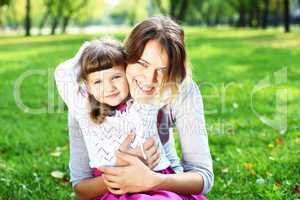 Mother and daughter in park