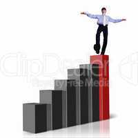 Businessman on Top of financial charts