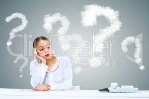 Young woman generating ideas in office