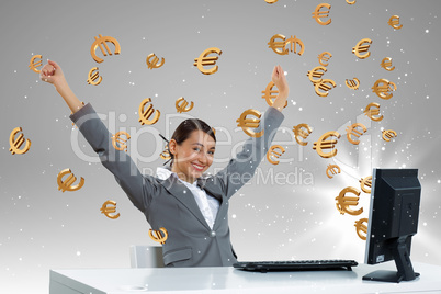 Businesswoman  at workplace and money symbols