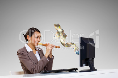 Businesswoman  at workplace and money symbols