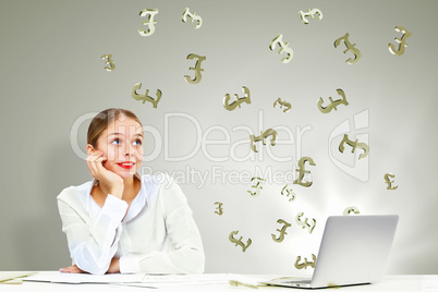 Businesswoman  at workplace and money symbols