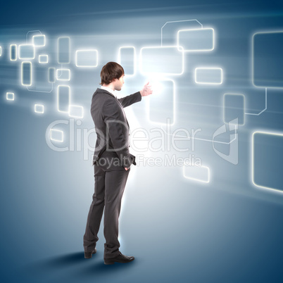 young man touches a virtual surface