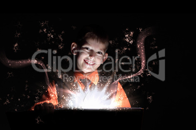 Child opening a magic gift box