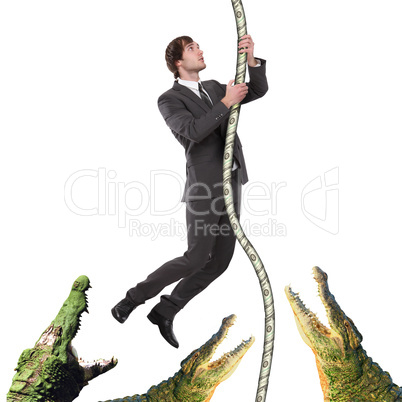 business man climbing up from crocodiles