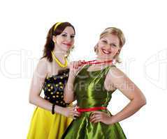 two young woman in bright colour dresses