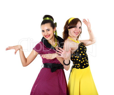 two young woman in bright colour dresses