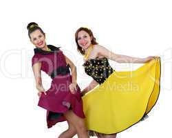 two young woman in bright colour dresses