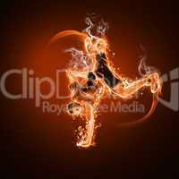 Fire dancer against black background