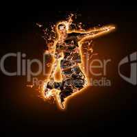 Fire dancer against black background