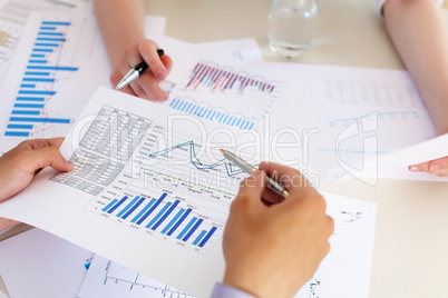 financial and business documents on the table