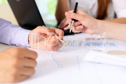 financial and business documents on the table