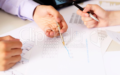 financial and business documents on the table