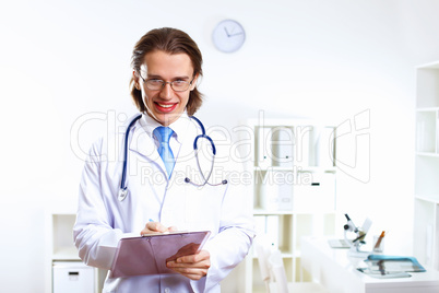 Friendly doctor in medical office