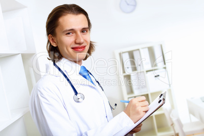 Friendly doctor in medical office