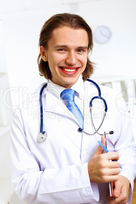 Friendly doctor in medical office