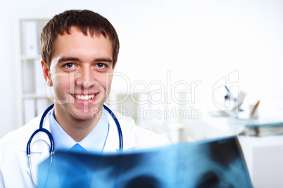 Friendly doctor in medical office