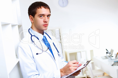 Friendly doctor in medical office