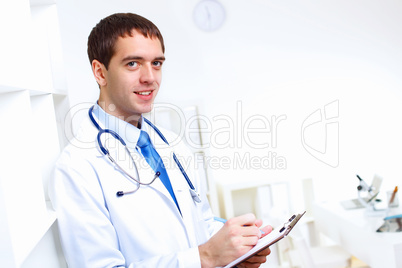 Friendly doctor in medical office