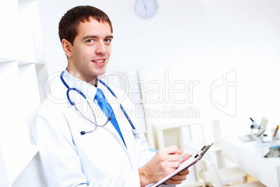 Friendly doctor in medical office