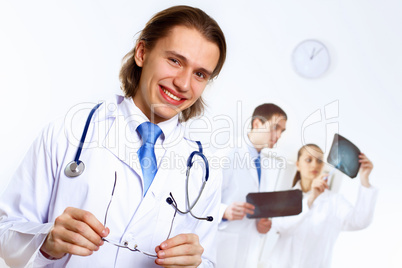 Friendly doctor in medical office