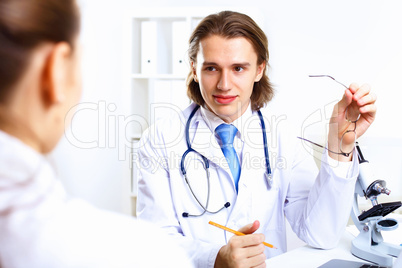 Friendly doctor in medical office