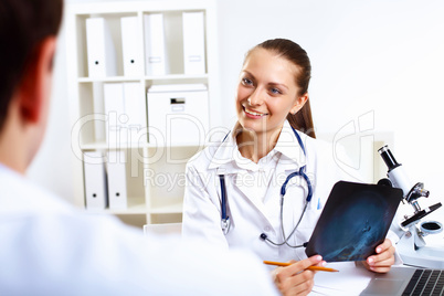 Friendly doctor in medical office