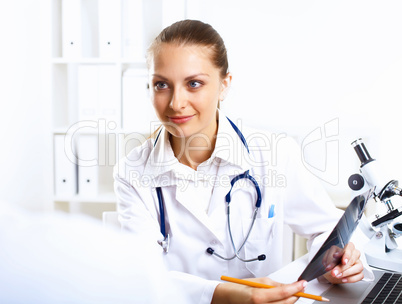 Friendly doctor in medical office